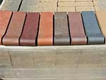 Assorted colors of brick pool coping